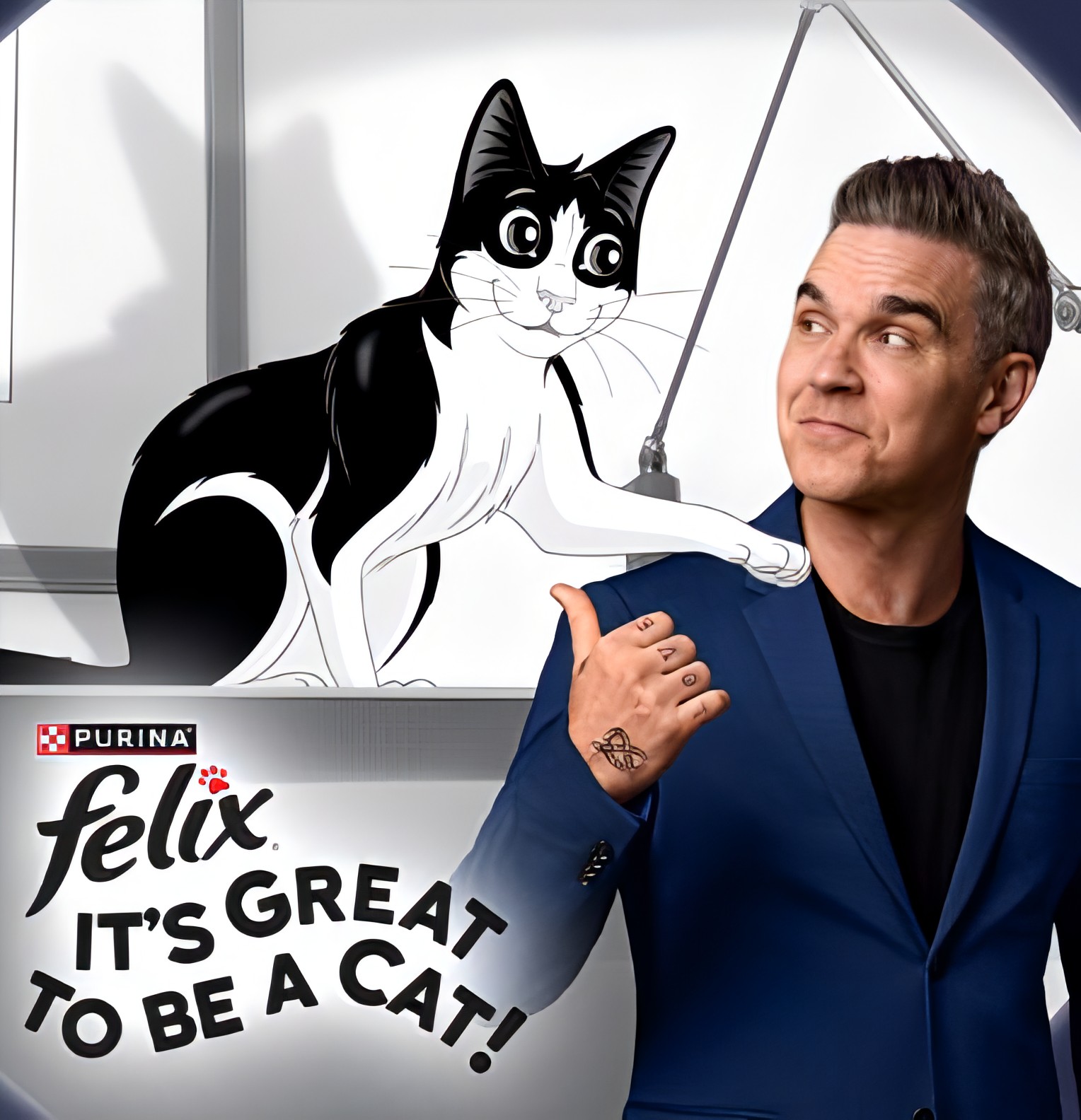 Musique de la Pub “Felix le chat” – “It’s Great To Be A Cat” par Robbie Williams.